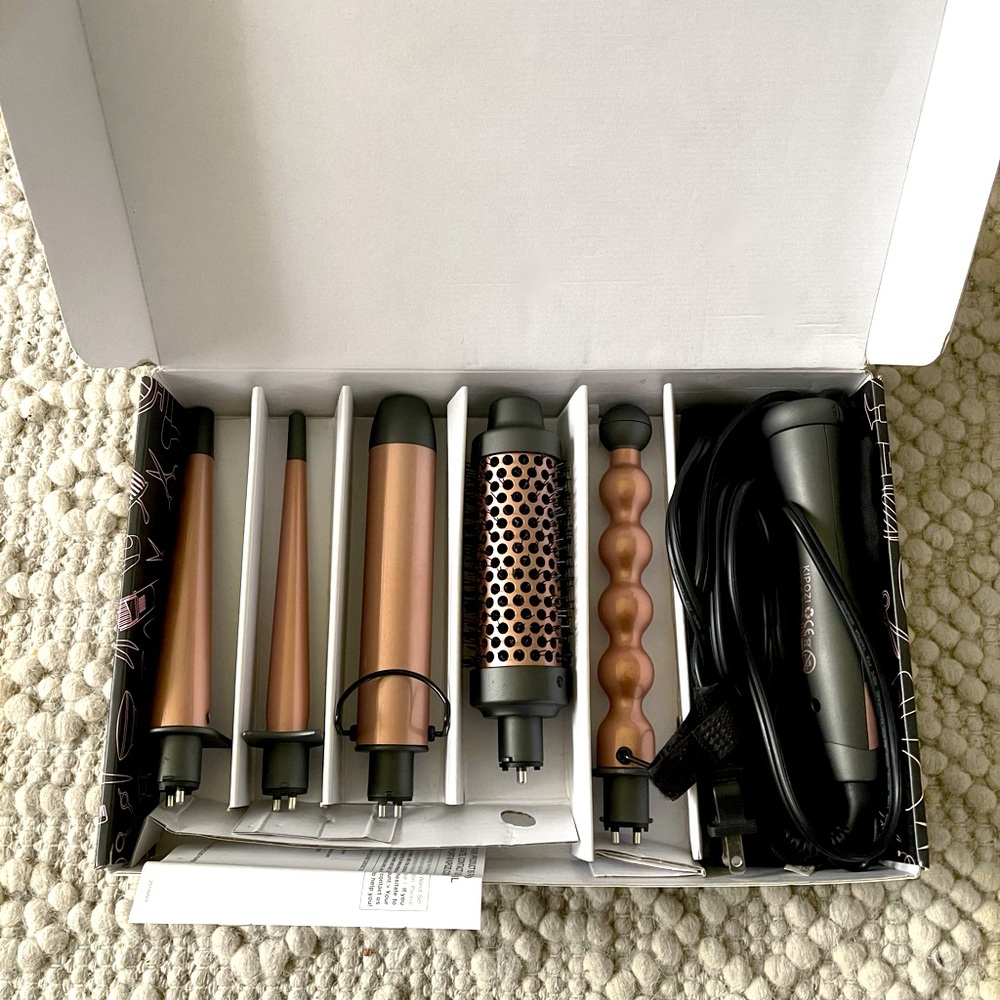 Super cute rose gold curling set with interchangeable wands!